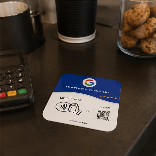 XTap review card beside a cafe payment terminal