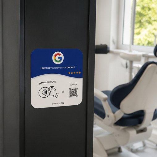 XTap review card mounted near a dental treatment room
